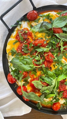 Fresh whole fish served with green beans and salad Chef Flannery Klette-Kolton