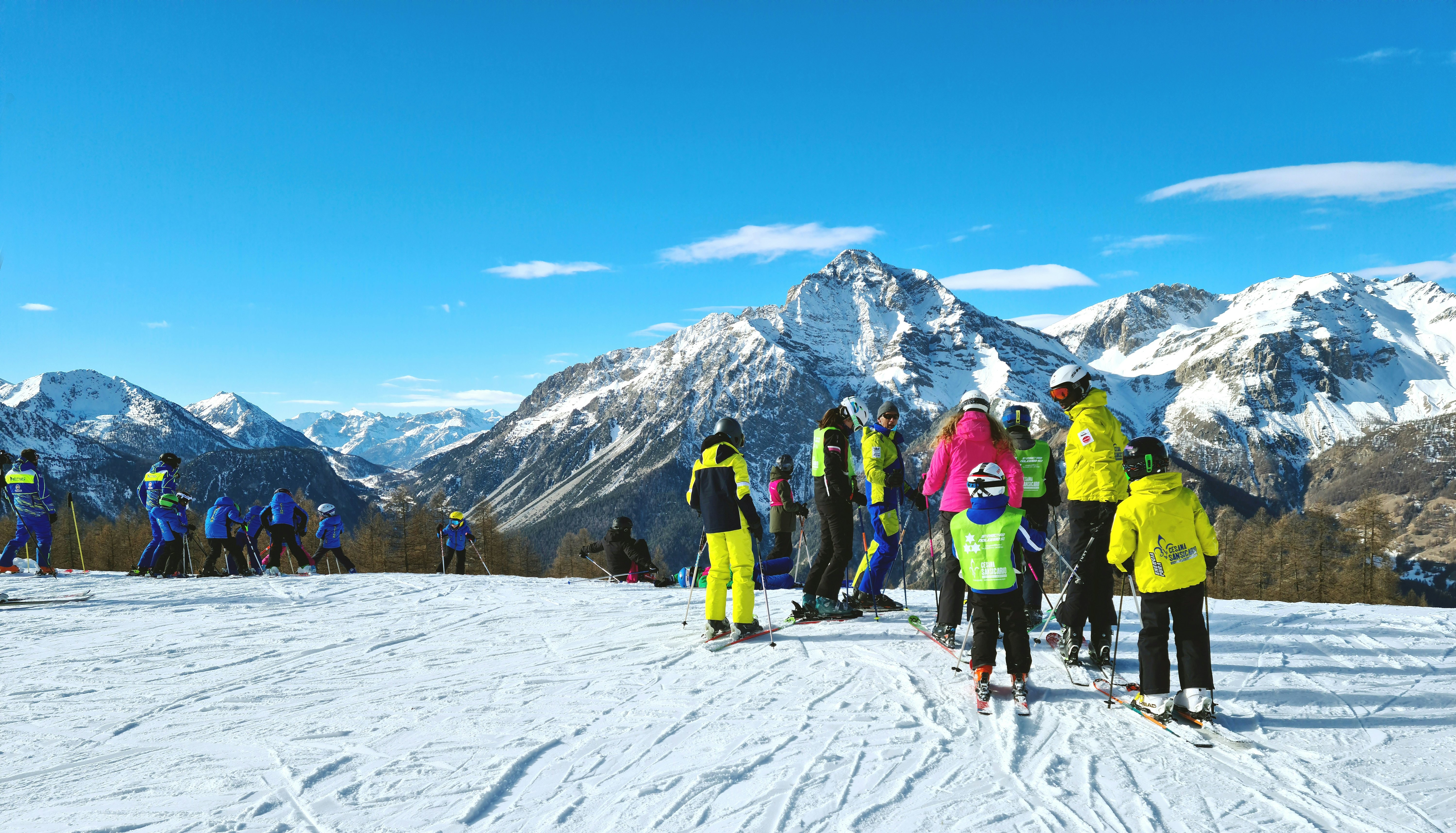 People on a ski slope in the Via Lattea ski area